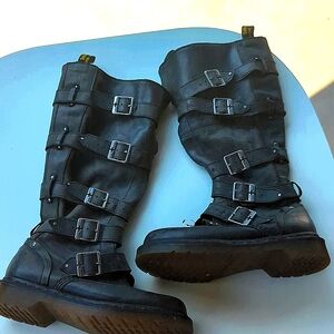 Dr marten calf length boots.